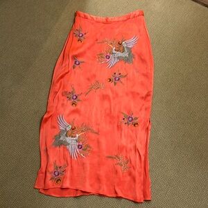 Anthropologie midi embroidered slip skirt.